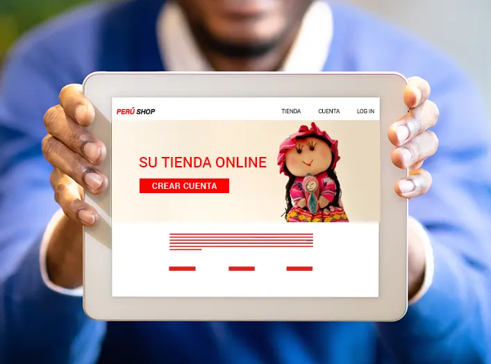 Persona mostrando una tienda virtual en una Tablet con muñeca peruana en el banner principal, representando la importancia de tienda online en Perú para emprendedores.
