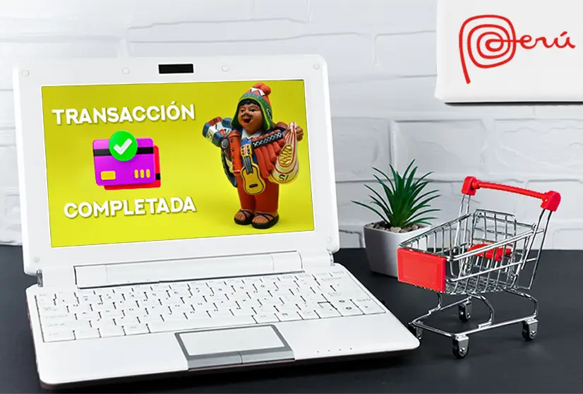 Laptop con pantalla de transacción completada y figura del Ekeko, símbolo de prosperidad andina en una tienda online peruana